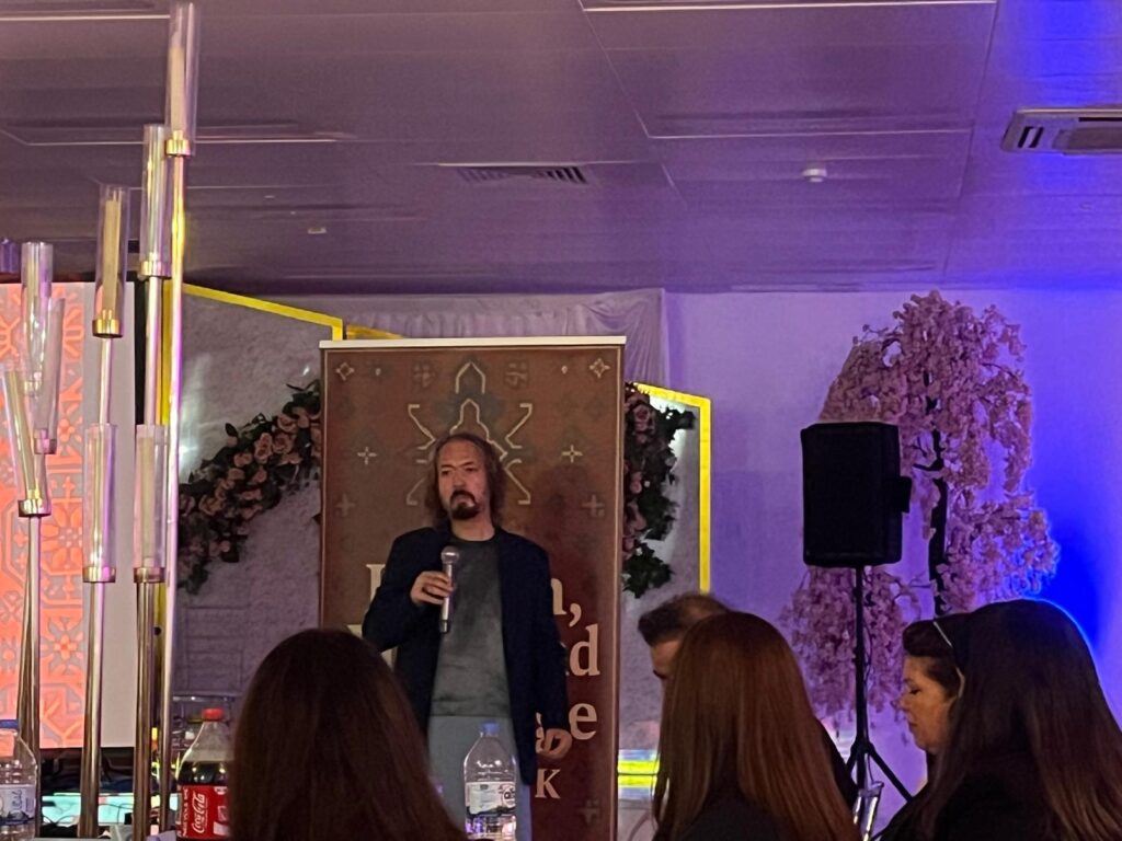 Afghanistani poet Reza Mohammadi speaking at AAHP-UK event