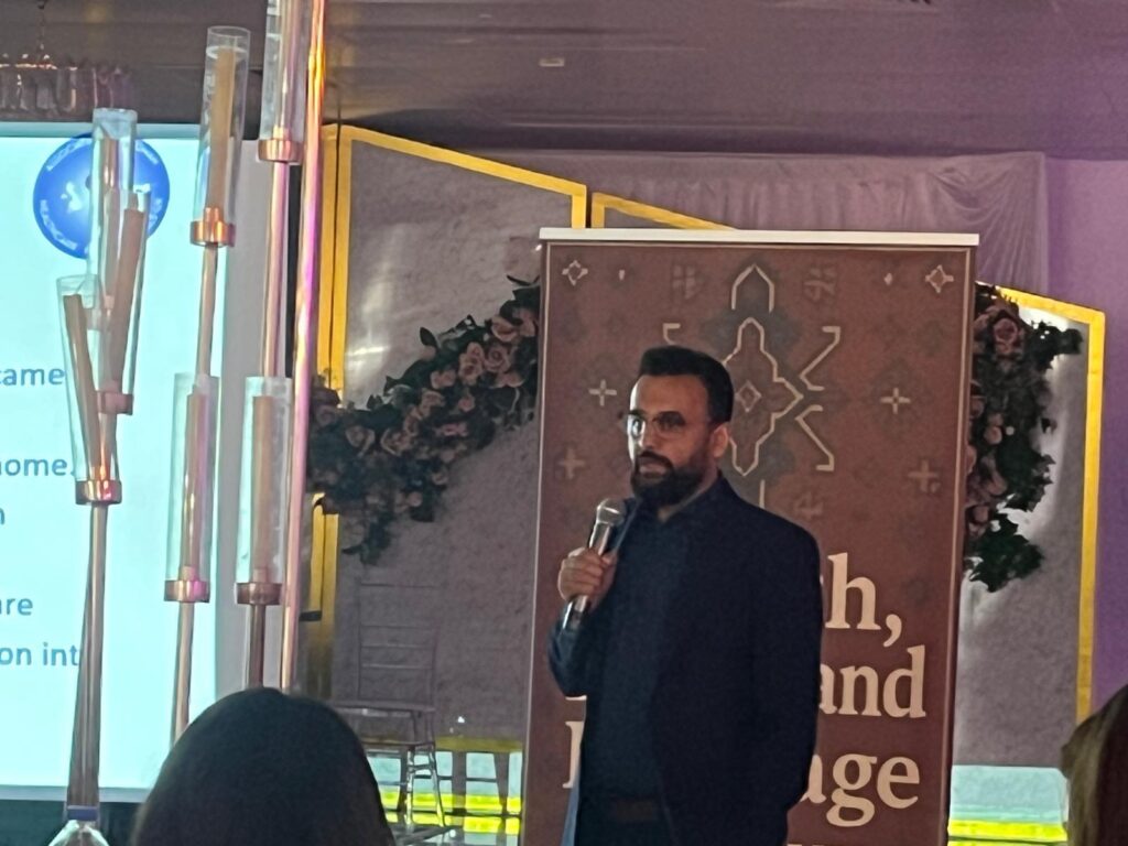 Speaker presenting at Health, Hope and Heritage event